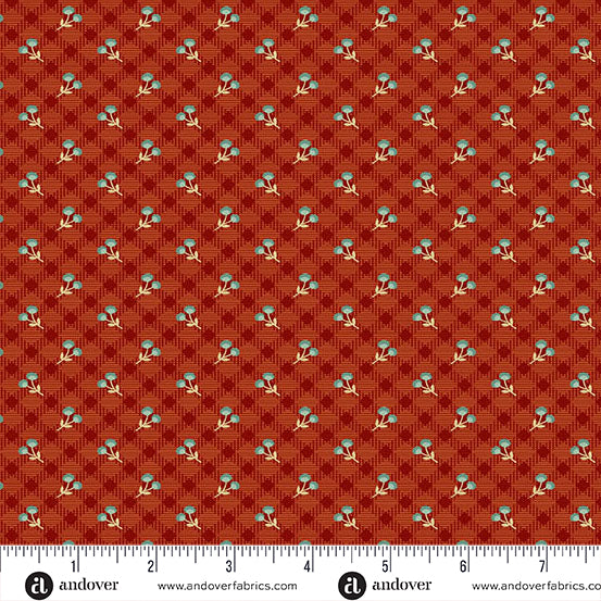 fabric swatch with a geometric print of small blue and while flower clusters on a background of diagonal orange red gingham