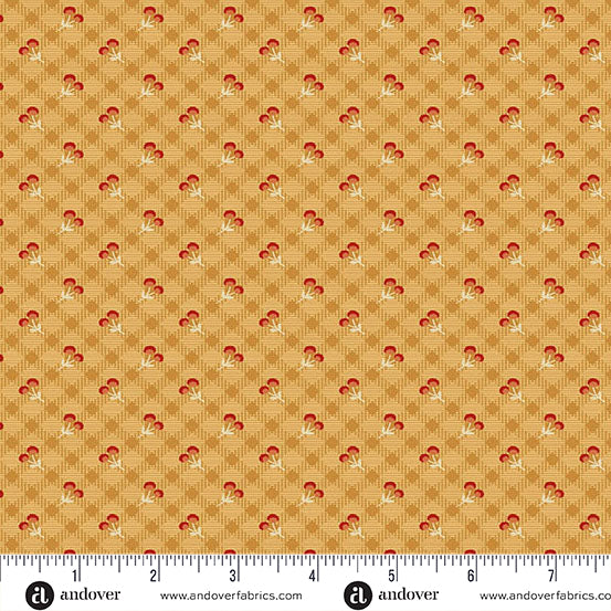fabric swatch with a geometric print of small red and white flower clusters on a background of diagonal golden yellow gingham