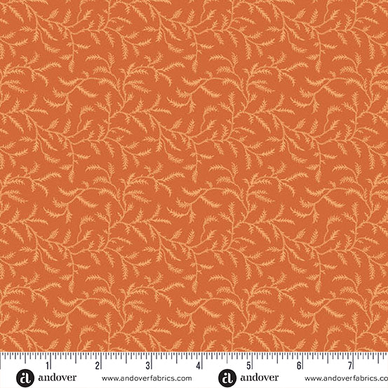 fabric swatch of a geometric print of a light orange fern silhouette on a darker orange background