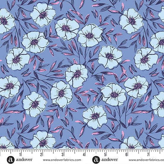 Floral pattern fabric with a ruler for scale on a blue background