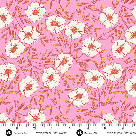 Floral pattern on pink fabric with a ruler for scale