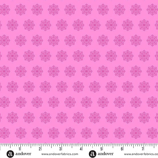 Pink fabric pattern with a ruler at the bottom for scale, featuring the brand 'Andover'.