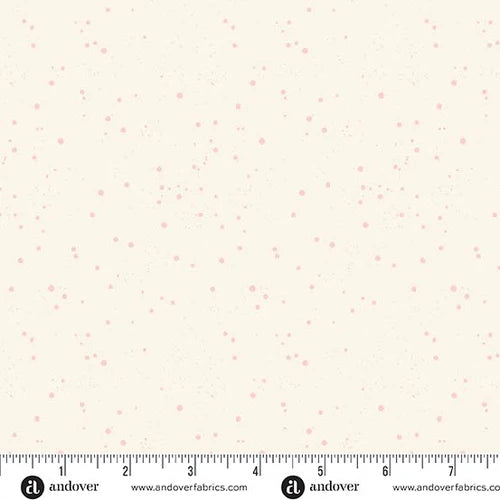 Fabric pattern with small pink dots on a cream background, featuring Andover Fabrics branding.
