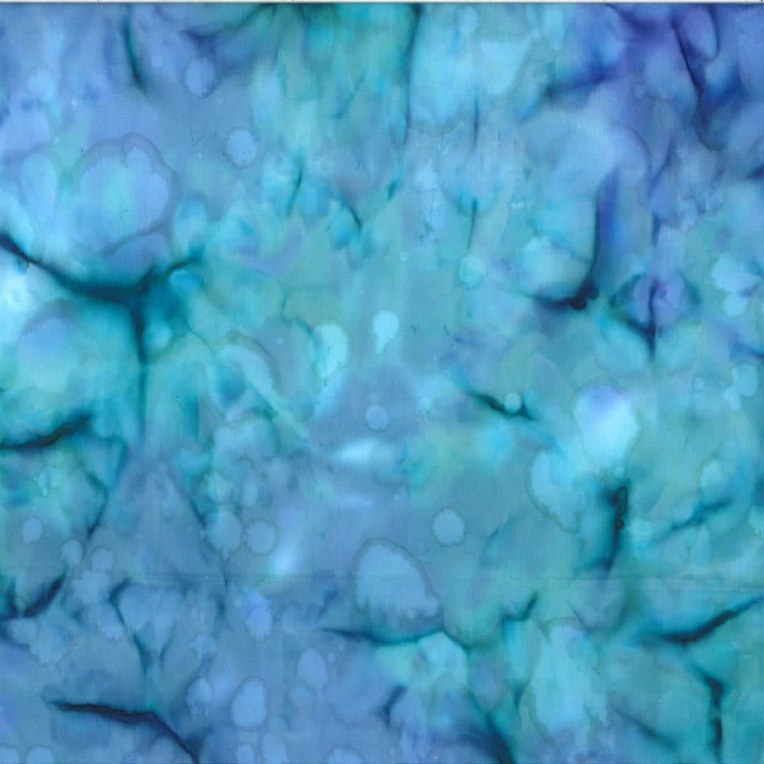 Close-up of textured blue and green fabric