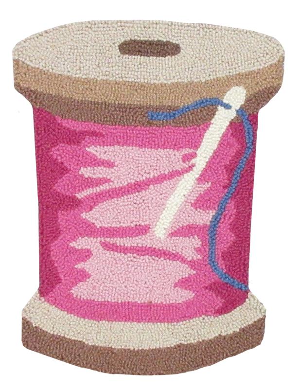 Decorative spool with pink yarn and a crochet hook on a white background
