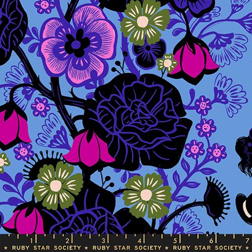 a variety of florals in black, purple, fuchsia, and green over a light blue background