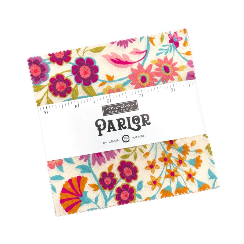 Floral-patterned charm pack with a ruler for scale on a white background, featuring the Parlor fabric collection by Crystal Manning