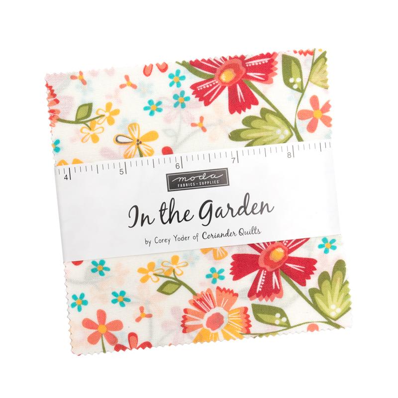Floral fabric swatch with a ruler and brand name on a white background