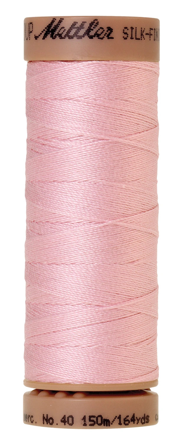 spool of Parfait Pink colored thread