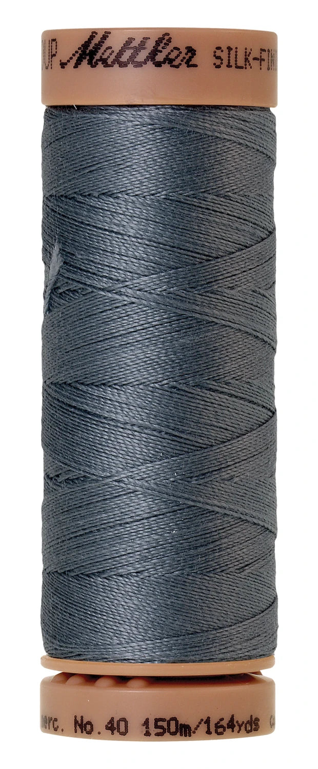 spool of Flint Stone colored thread