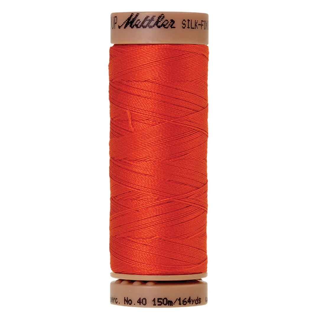 spool of Paprika colored thread