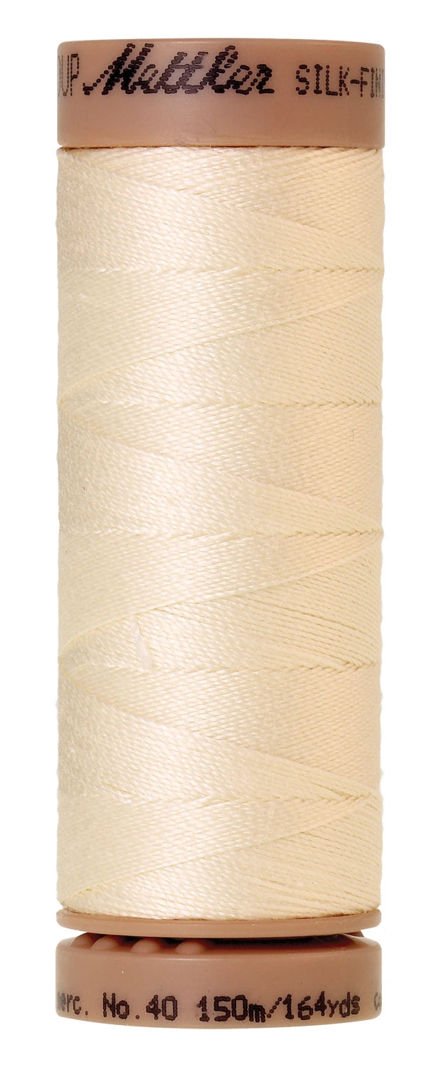 spool of Muslin colored thread