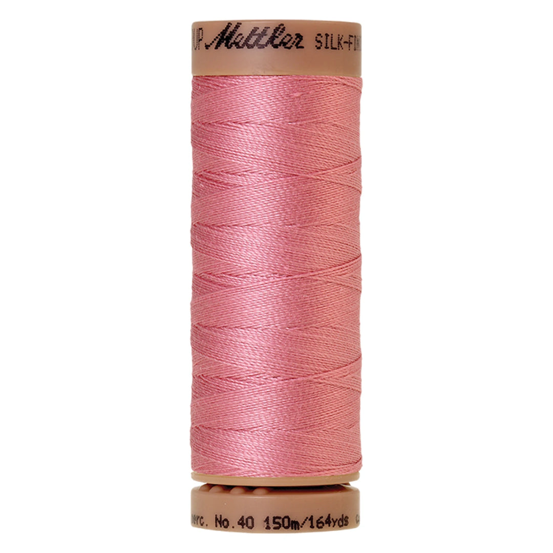 spool of Rose Quartz colored thread