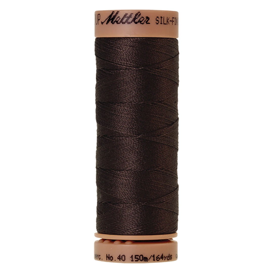 spool of Black Peppercorn colored thread