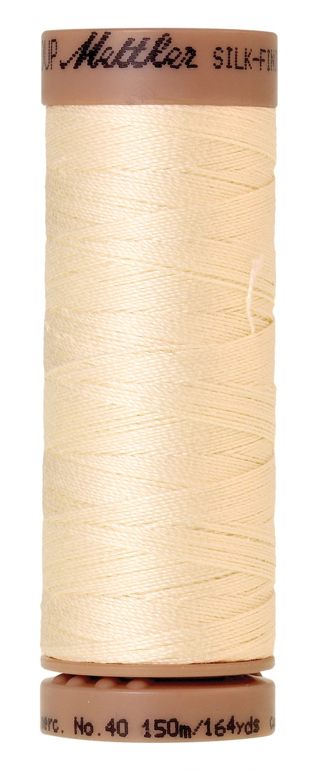 spool of Antique White colored thread