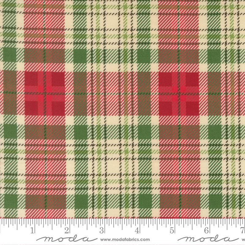 Plaid fabric pattern with red, green, and beige colors on a white background, featuring a Moda label.