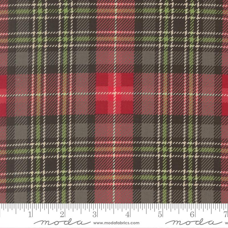 Plaid fabric pattern with red, green, and black colors on a white background, featuring the Moda Fabrics logo.