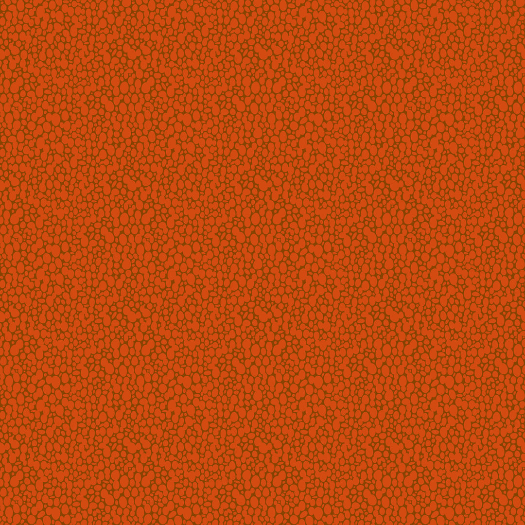 orange stone/pebble silhouette print on a brown background