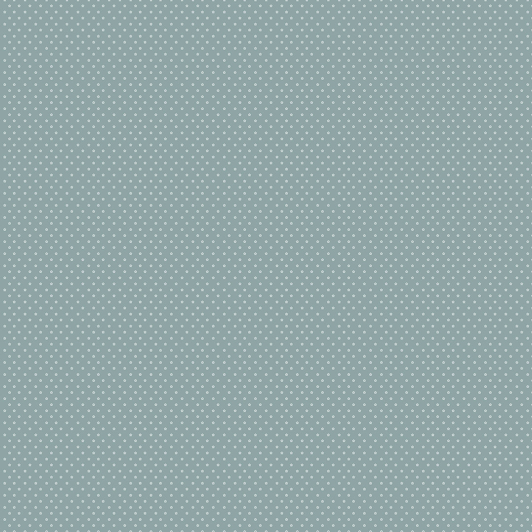Patterned fabric swatch with small white dots on a light blue background