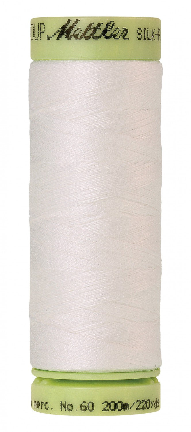 slightly off white 60 weight cotton thread