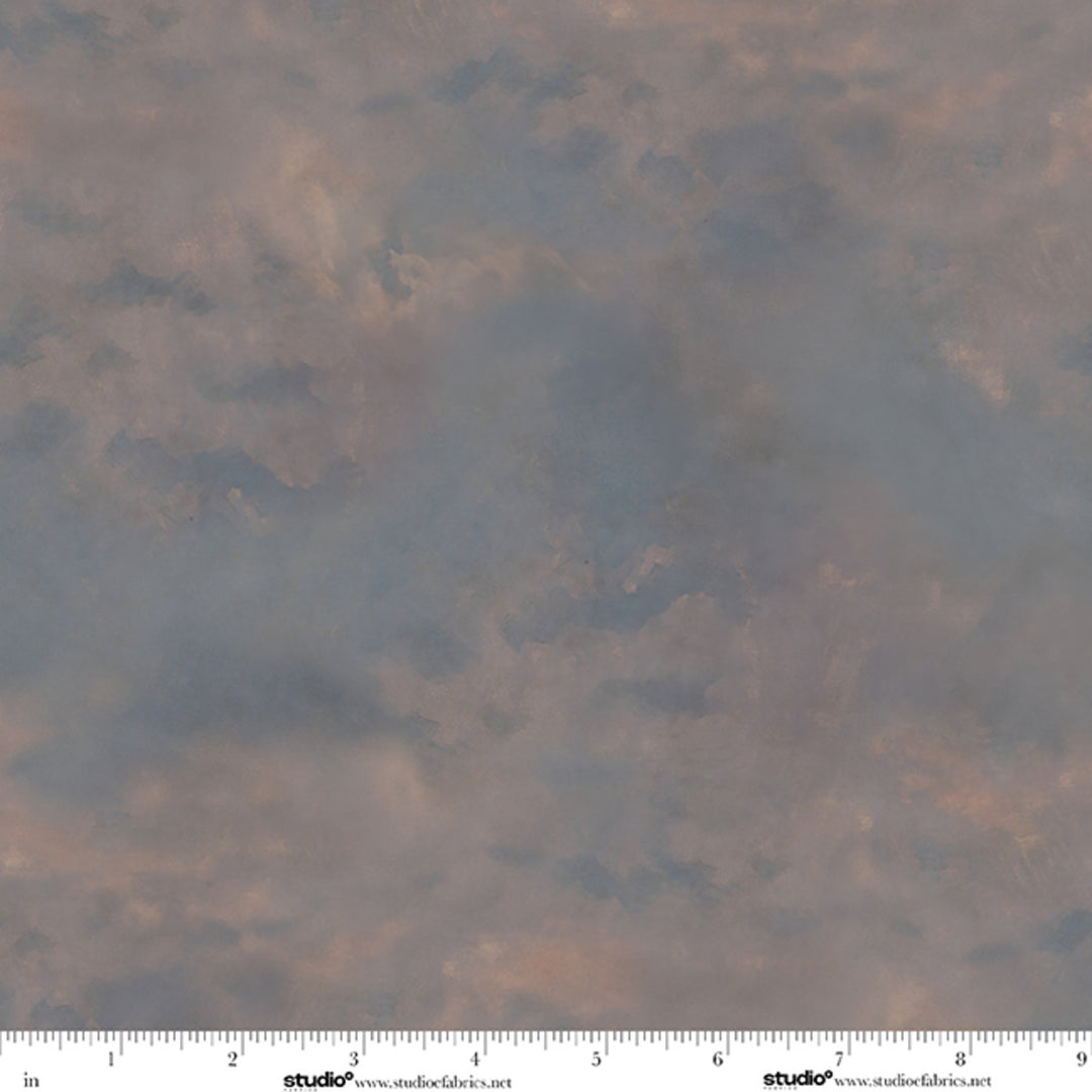 Textured brown fabric pattern with a ruler at the bottom