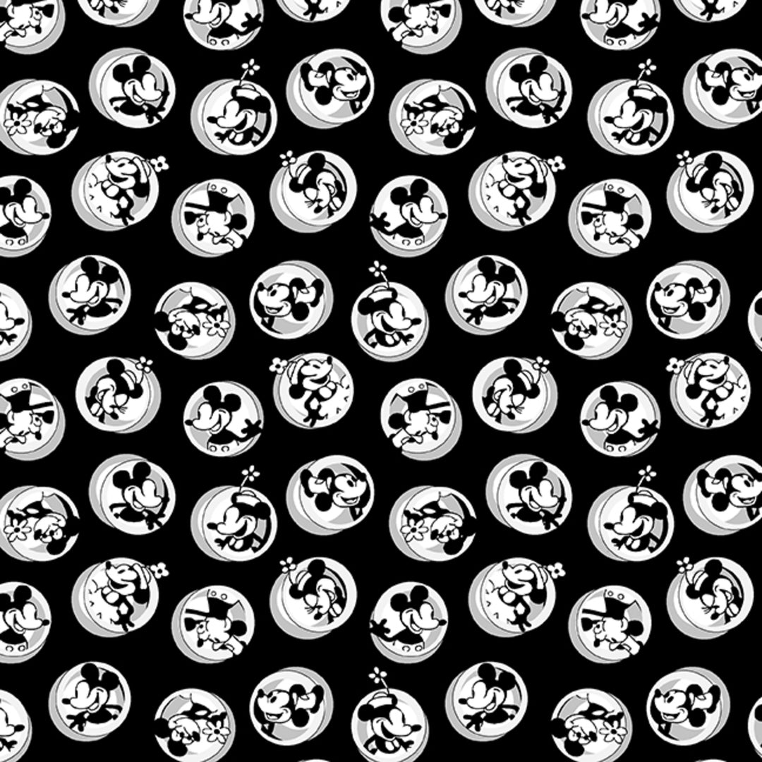 Black background with round Mickey and Minnie decals