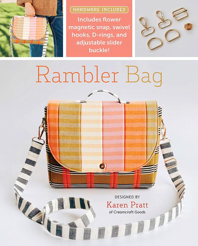 Plaid bag with striped strap on a white background, featuring text about hardware included.
