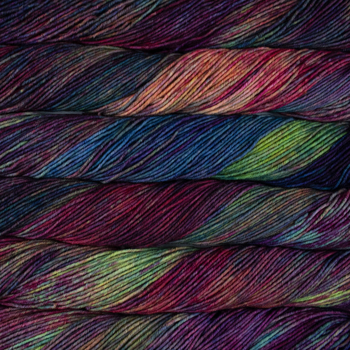 Multicolored yarn skeins stacked on top of each other
