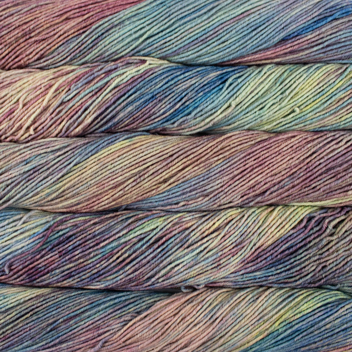 Multicolored yarn skeins stacked on top of each other