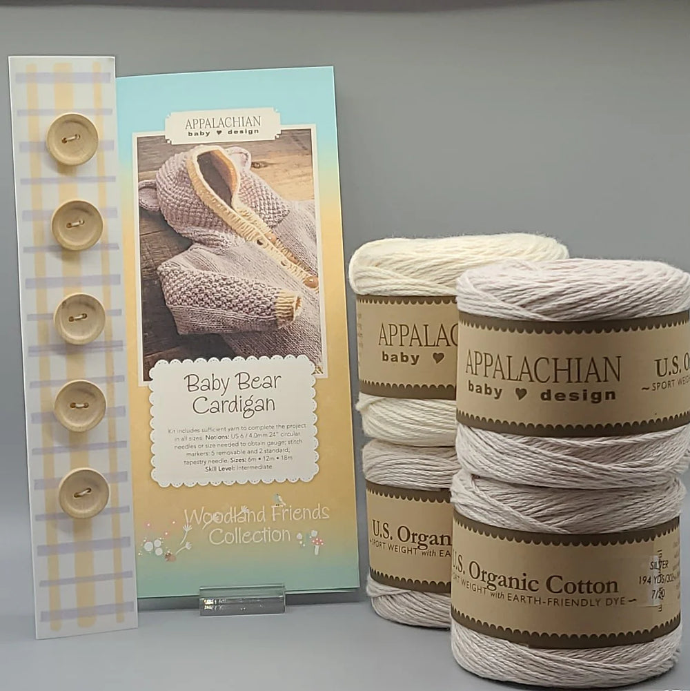 Baby Bear Cardigan Kit includes yarn, buttons, and pattern