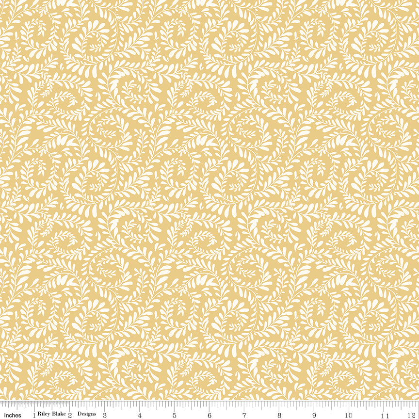 Yellow background with white swirls of leaves