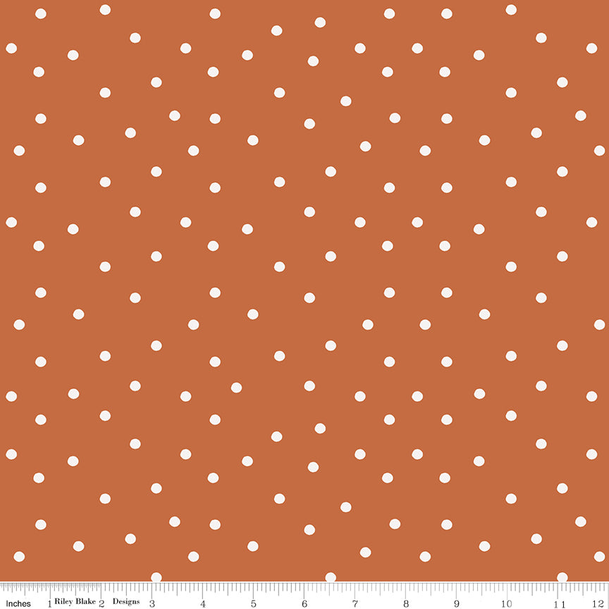 Brown background with white dots