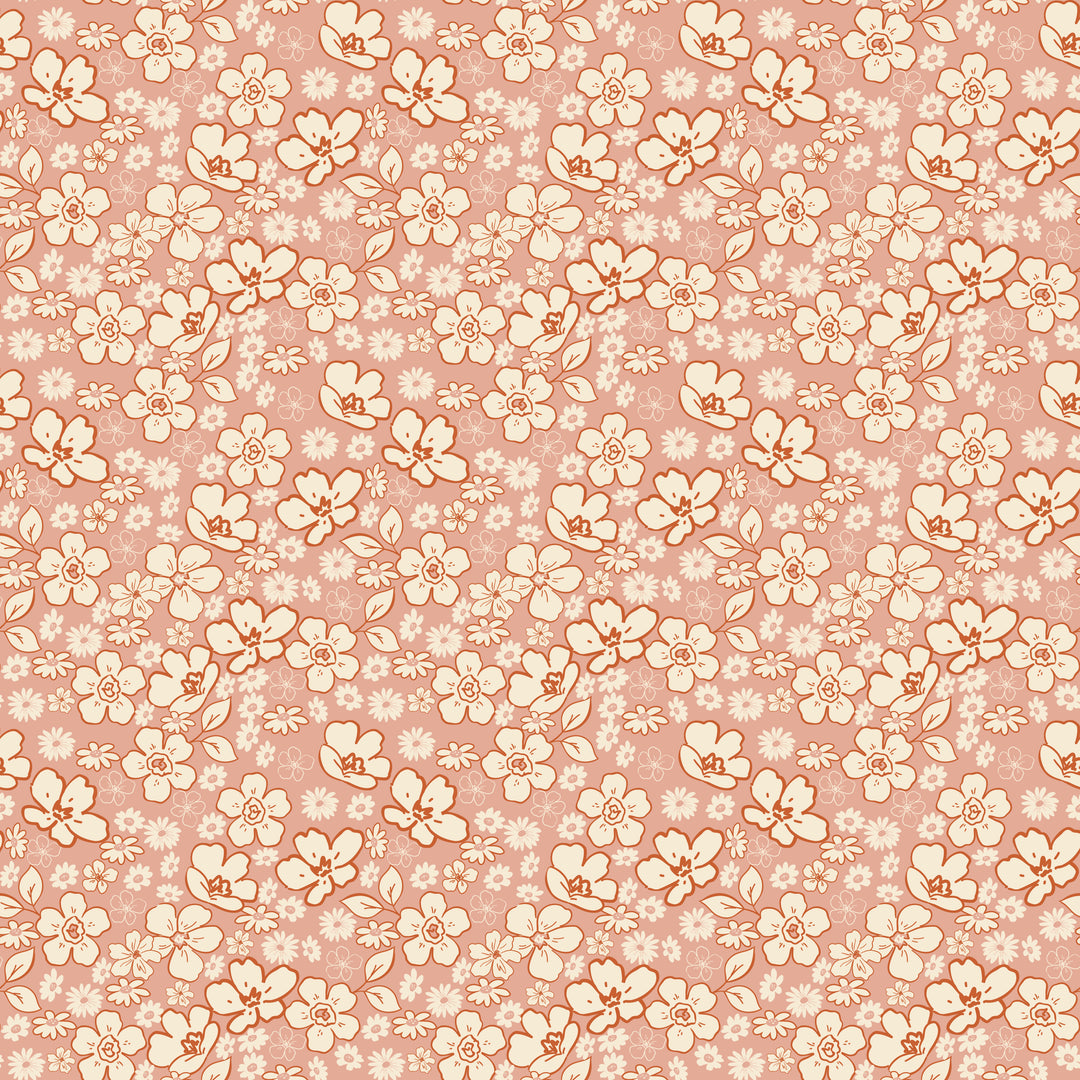 Floral pattern with small flowers on a pink background