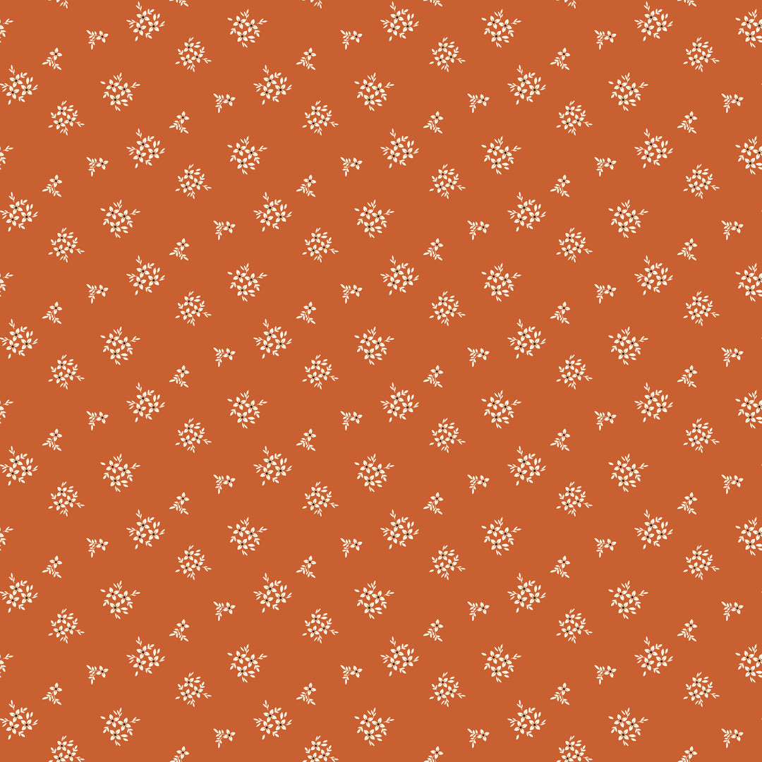 Small white floral pattern on a red-brown background