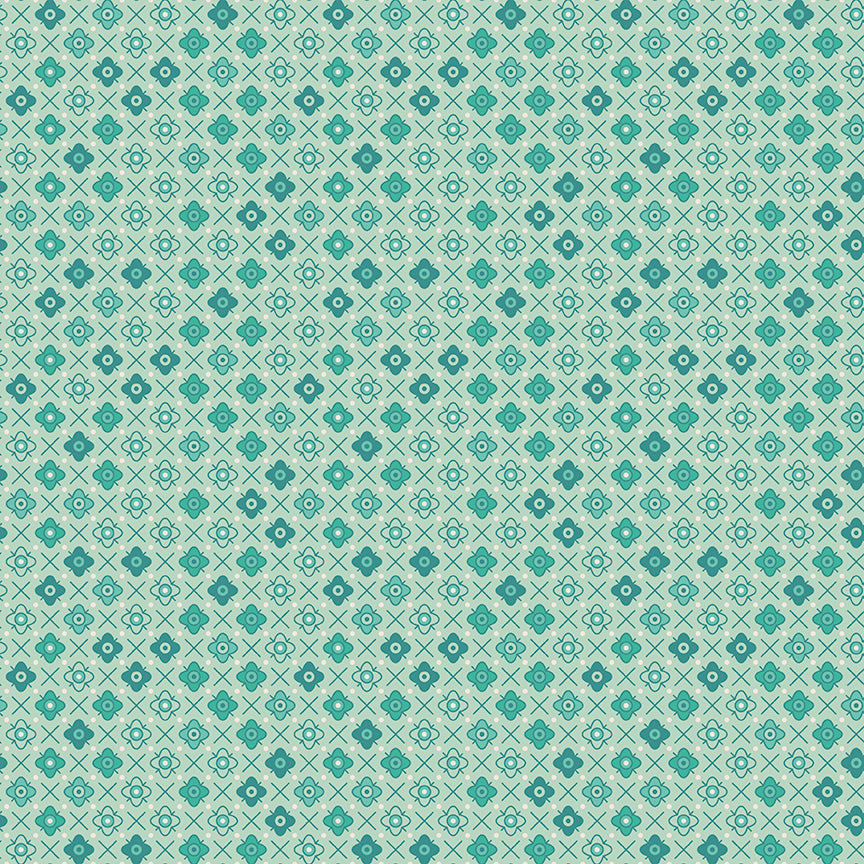 This print features a grid of blossoms and crisscrosses in a sage color way