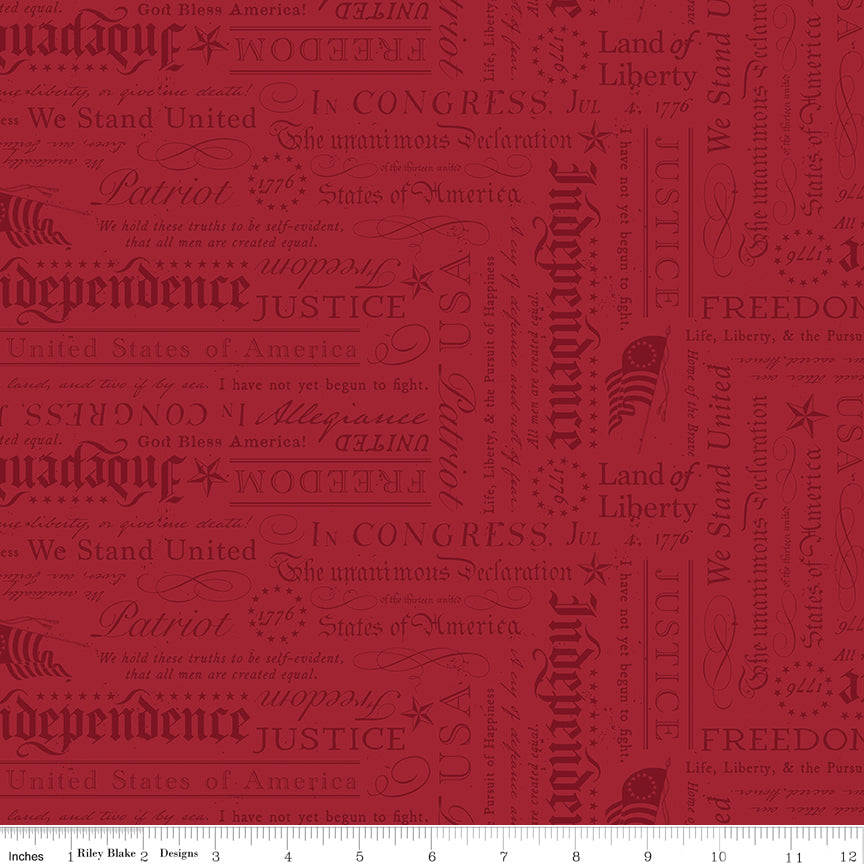 Red fabric with black text and symbols on a red background
