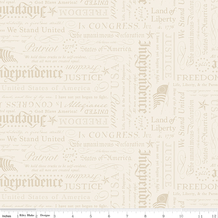 Fabric with American-themed text and graphics on a beige background