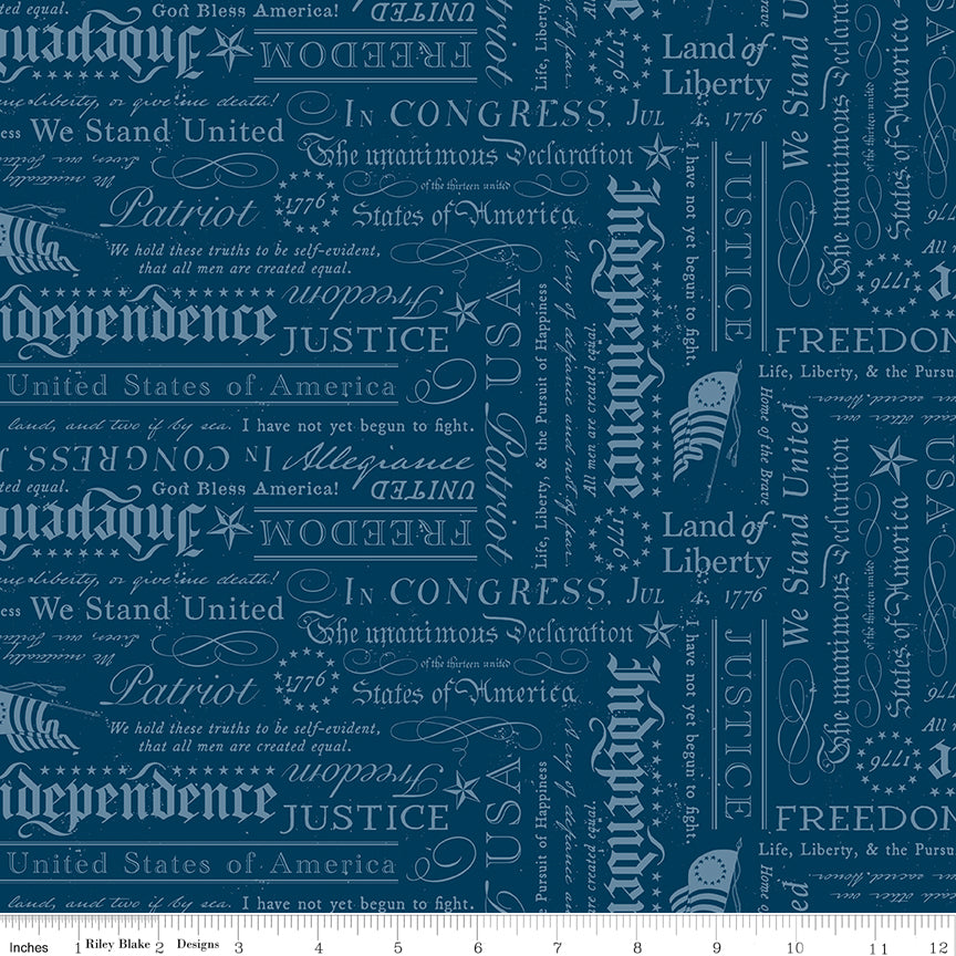 Textured blue fabric with white text and graphics on a blue background