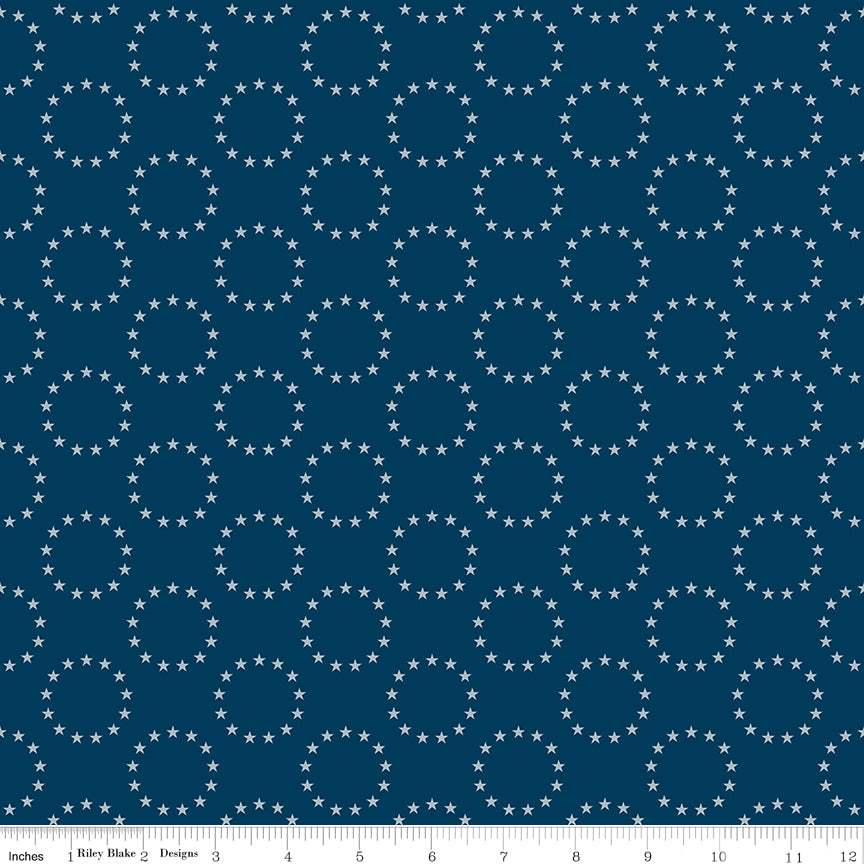 Pattern of white stars within circles on a blue background