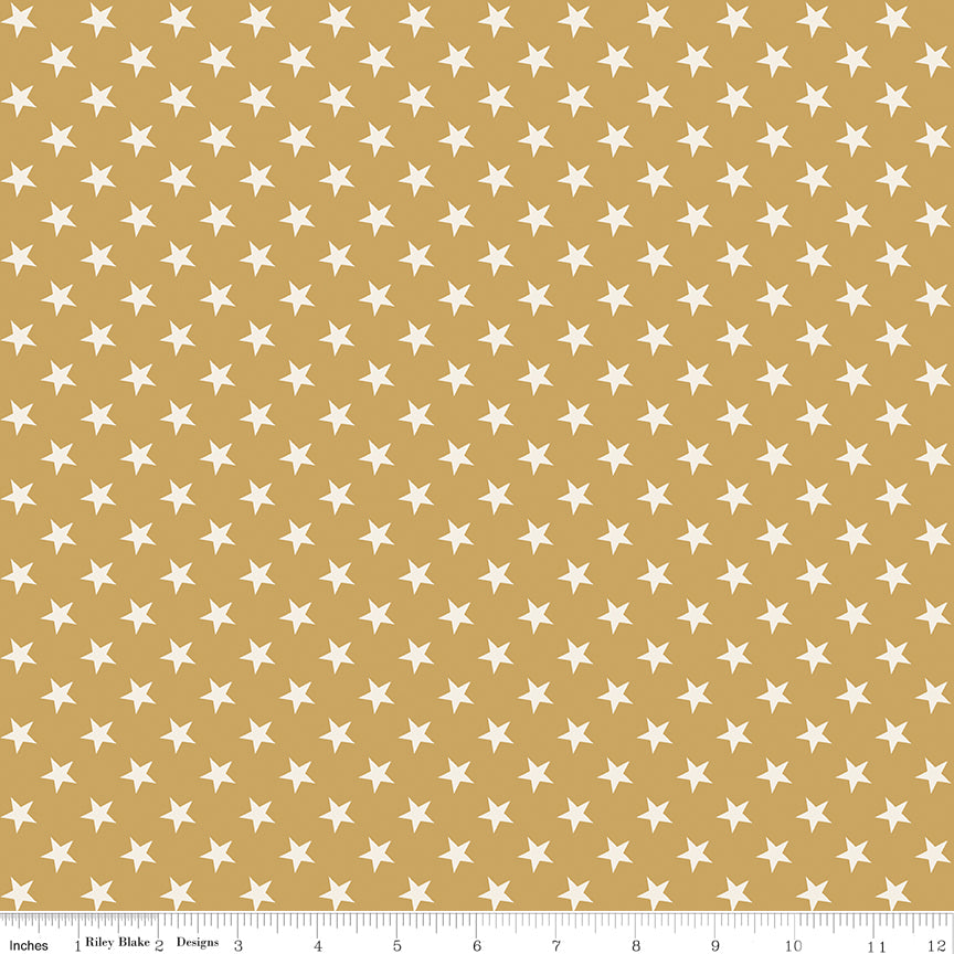 Pattern of white stars on a mustard yellow background with a ruler at the bottom.