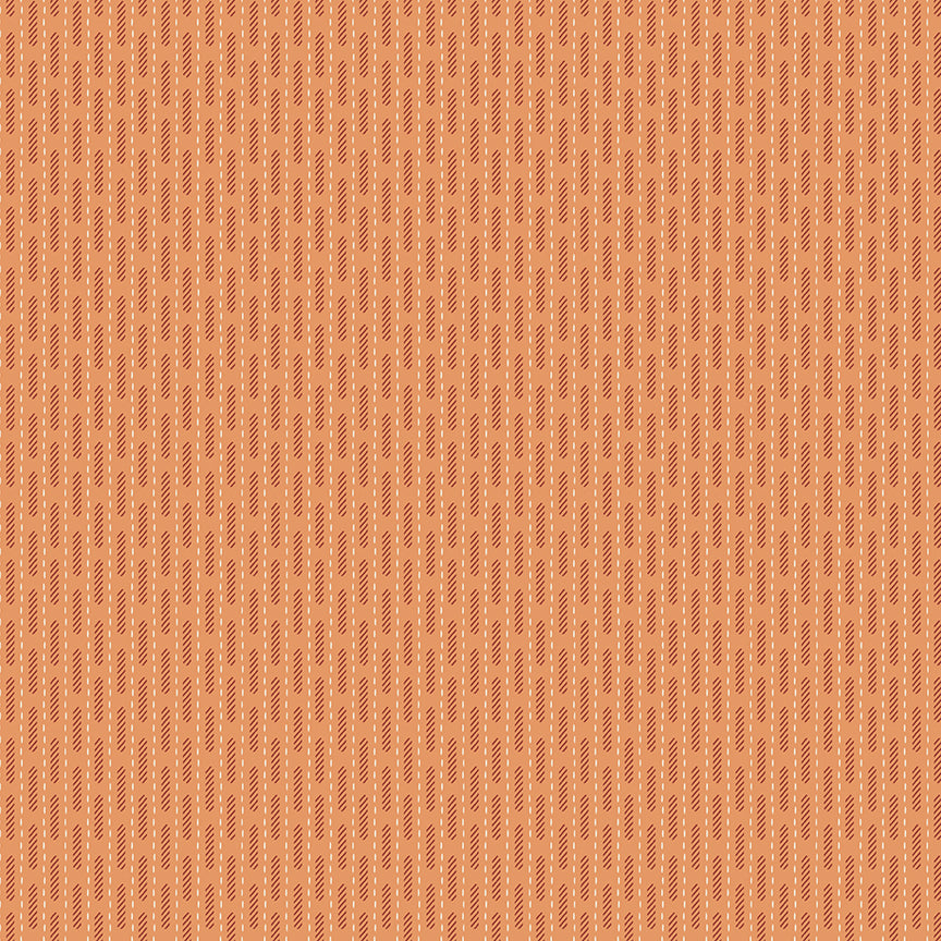 Patterned fabric texture on a peach background