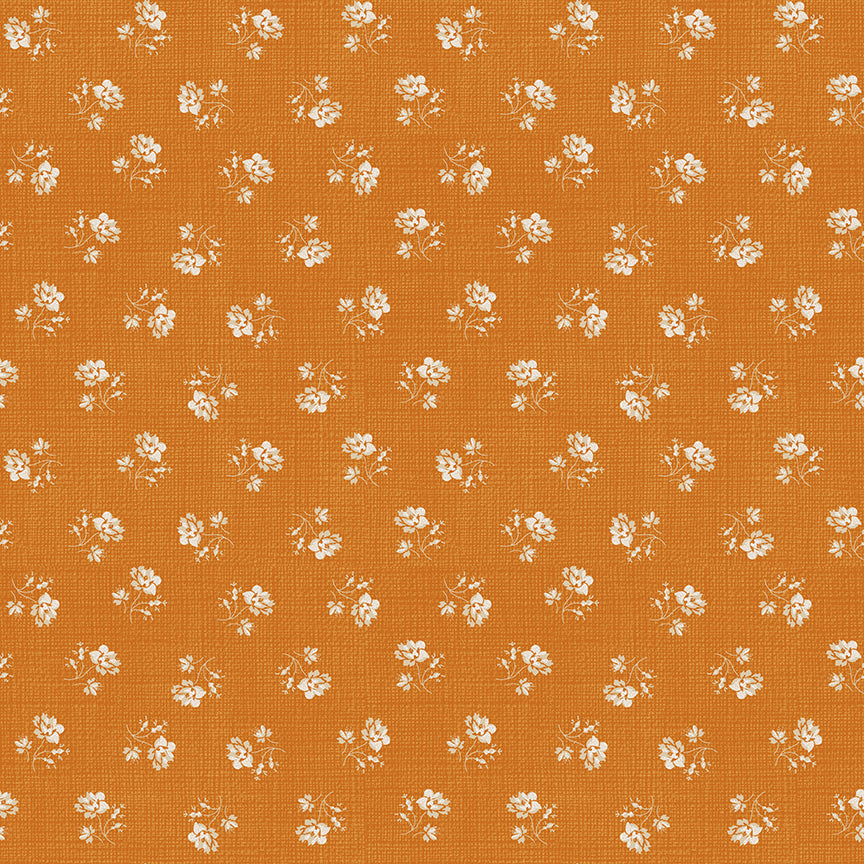 Small white floral pattern on an orange background