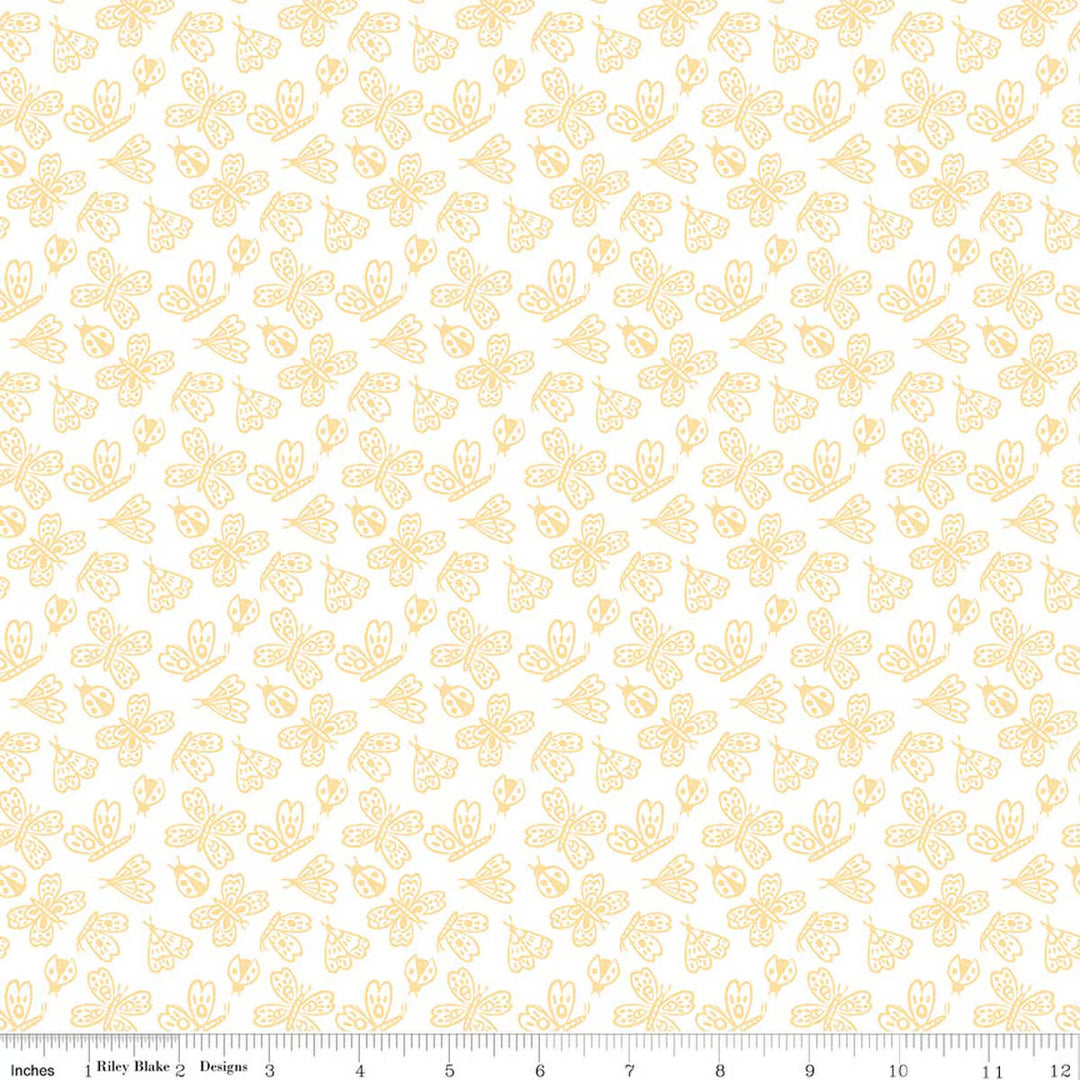 This print features outlined butterflies, moths, and lady bugs on a light background. There is a ruler along the bottom for scale. 