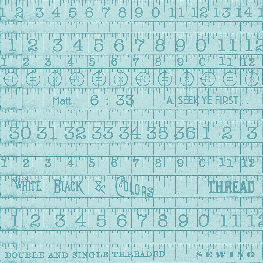 Pattern of sewing ruler design with text on a blue background