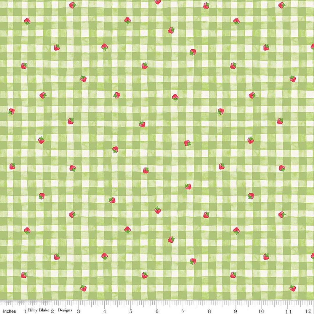 Green and white checkered fabric with small red flowers pattern