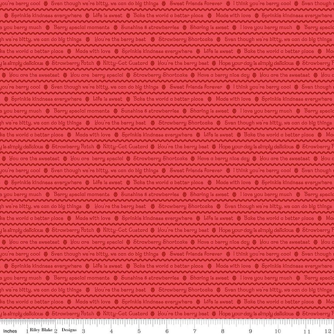 Solid red fabric texture with a ruler at the bottom for scale.