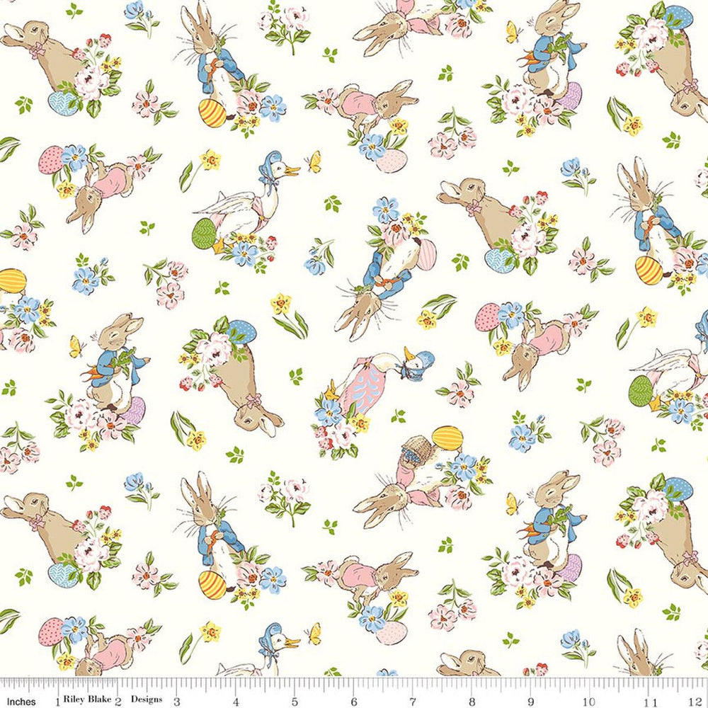 Pattern of cartoon bunnies and flowers on a white background with a ruler at the bottom for scale