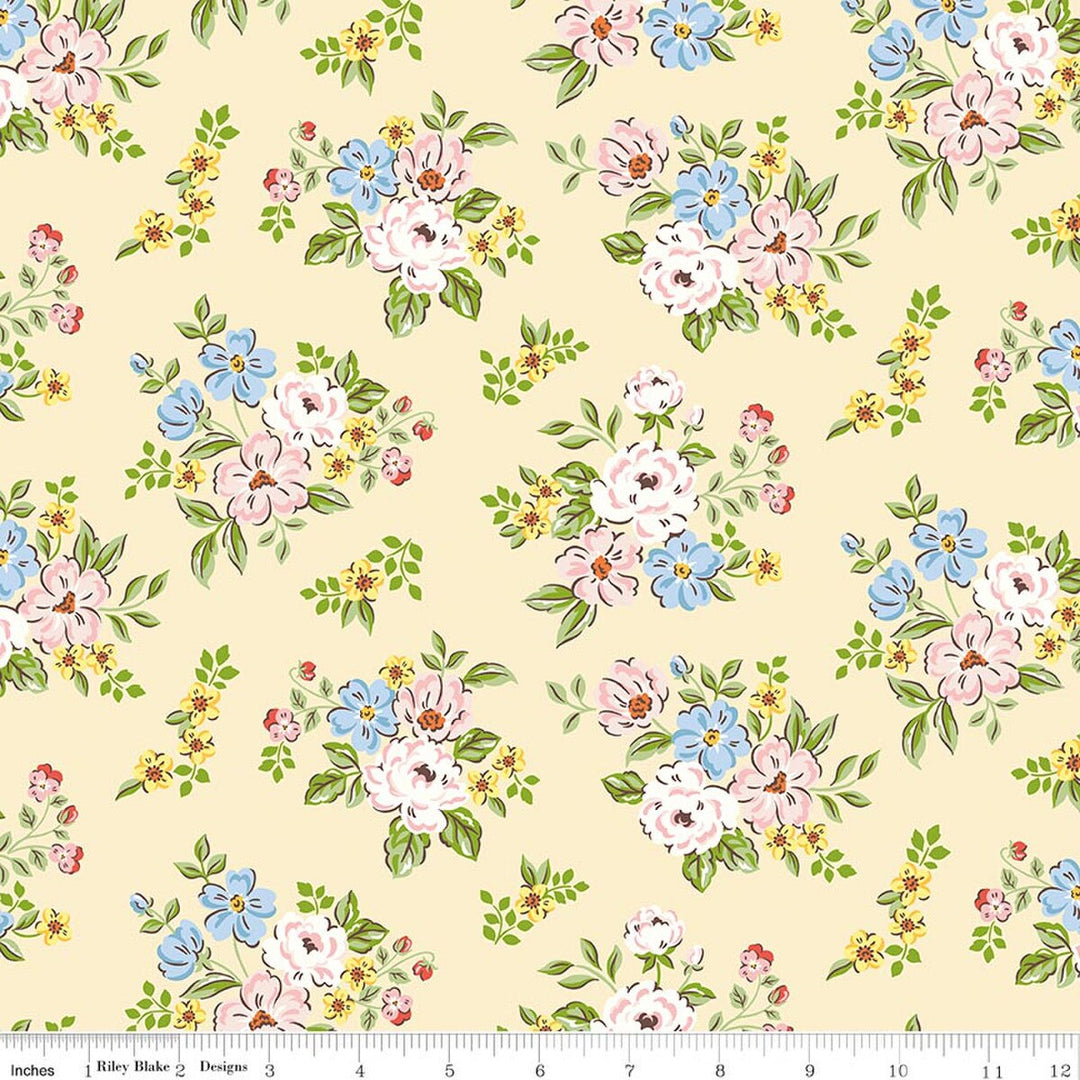 Floral pattern with pink, blue, and yellow flowers on a beige background