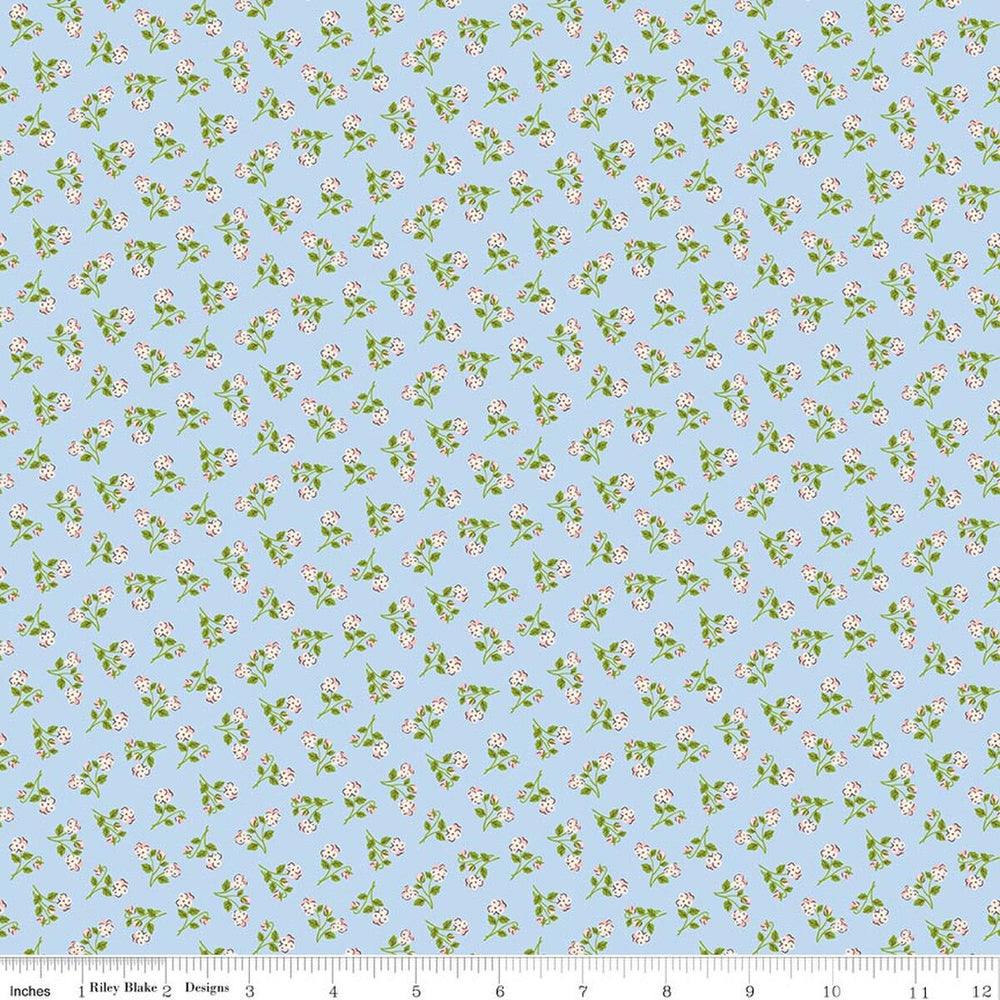 Floral pattern fabric swatch on a blue background