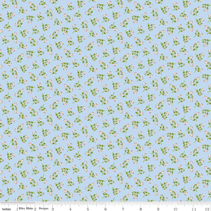 Floral pattern fabric swatch on a blue background